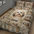 Close bedroom view of a Havanese quilt blanket with repeated dog portraits and daisies