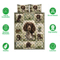 Boykin Spaniel quilt bedding set with repeated dog portraits, daisies, and garden-inspired panels