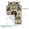 Boykin Spaniel quilt close-up showing a floral dog design, printed front, and quilted white backing