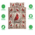 Cardinal quilt bedding set displayed with red bird artwork and product feature icons around the design