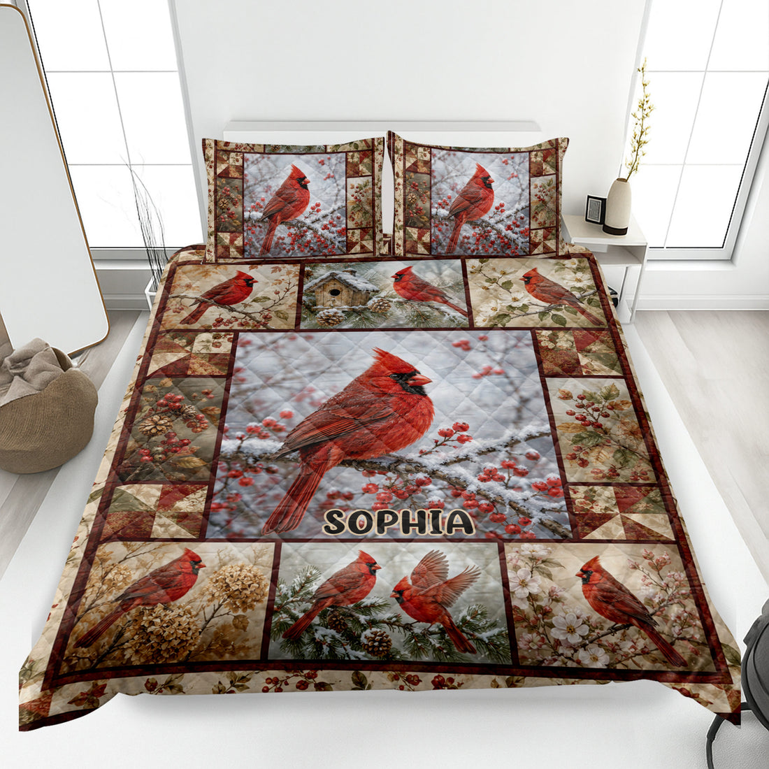 Cardinal quilt blanket displayed on a bed with red birds, winter branches, berries, and coordinating pillows
