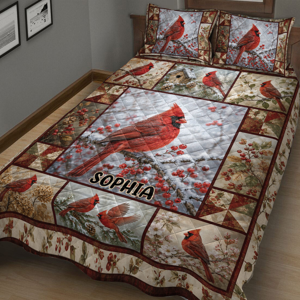 Close bedroom view of a cardinal quilt blanket featuring red birds on snowy branches and berry accents