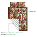 Cardinal quilt showing the printed front and white quilted backing with a detailed bird and nature design