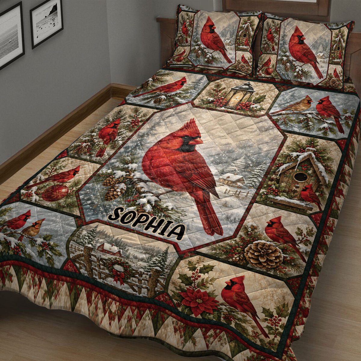 Close view of cardinal quilt bedding with red birds, snowy scenery, pinecones, berries, and festive winter details