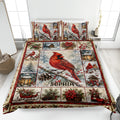 Cardinal quilt blanket bedding set with red birds, snowy branches, lanterns, and winter holiday scenes