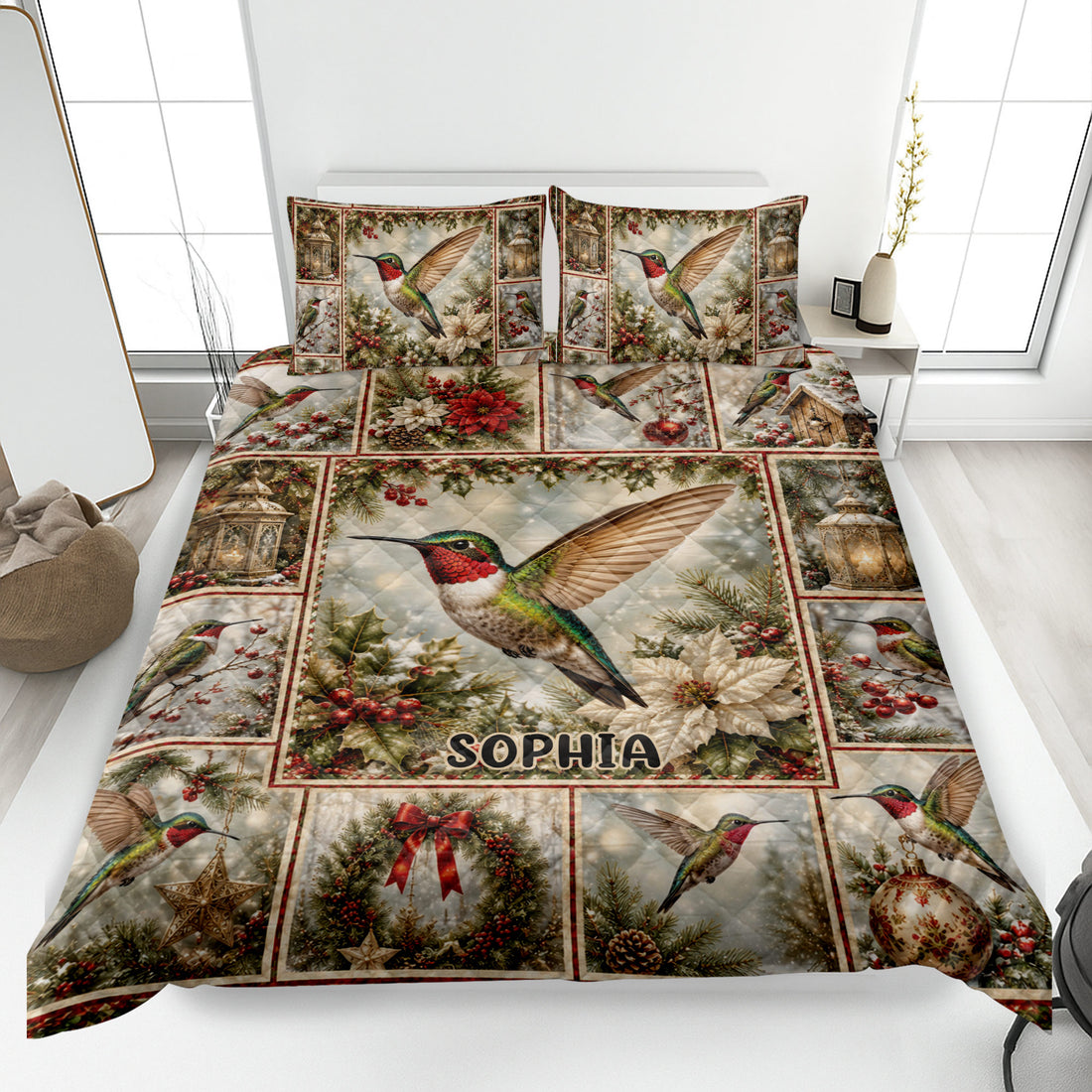 Hummingbird quilt blanket displayed on a bed with colorful birds, poinsettias, lanterns, and holiday greenery