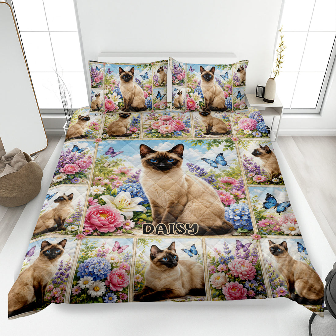 Siamese cat quilt blanket displayed on a bed with colorful flowers and butterflies