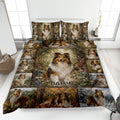 Sheltie quilt bedding set displayed on a bed with woodland portraits, flowers, and seasonal scenery