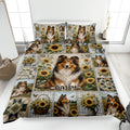 Sheltie quilt blanket spread across a bright bedroom with sunflower patchwork and coordinating dog portraits