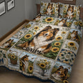 Close view of Sheltie quilt bedding with sunflower scenes, pastoral artwork and a large central dog portrait