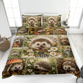 Hedgehog quilt blanket displayed on a bed with floral woodland artwork and multiple hedgehog scenes