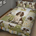 English Springer Spaniel quilt bedding set shown on a bed with repeated dog portraits