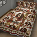 Close bedroom view of English Springer Spaniel Christmas quilt bedding with plaid, gifts and holly details