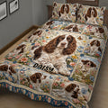 English Springer Spaniel quilt bedding displayed in a bedroom with garden-inspired floral artwork
