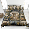 Greyhound quilt blanket displayed on a bed with botanical panels, navy accents, and multiple sighthound portraits