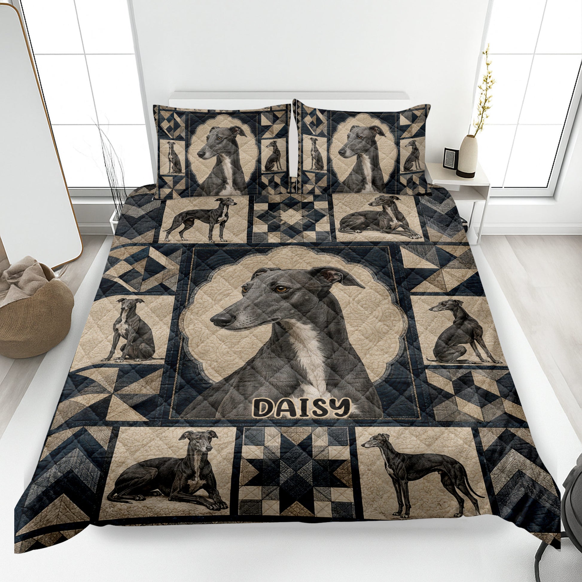 Greyhound quilt blanket spread across a bed with multiple dog portraits and navy geometric patchwork