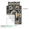 Greyhound quilt blanket detail showing the printed front and quilted white backing