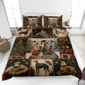 Christmas greyhound quilt blanket displayed on a bed with festive tartan, trees, stockings, and dog artwork