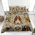 Basset Hound quilt blanket displayed on a bed with daisies, patchwork blocks, and dog artwork