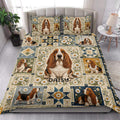 Basset Hound quilt blanket styled on a bedroom bed with floral patchwork artwork