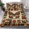 Butterfly quilt blanket styled in a bedroom with festive poinsettias, snowflakes, and holly