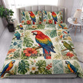 Parrot quilt bedding styled in a bright bedroom with macaws, tropical leaves, and vibrant flowers
