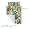 Tropical parrot quilt showing the printed front and white stitched reverse layer