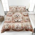 Maltese dog quilt blanket displayed on a bed with floral panels, pink bows, and ornate romantic artwork