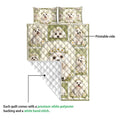 Maltese dog quilt showing its printed front and white diamond-stitched backing