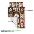 Maltese Christmas quilt blanket shown with its printed front and white quilted backing