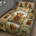 Rustic Highland cow quilt blanket featuring daisies, calves, floral borders, and countryside scenes
