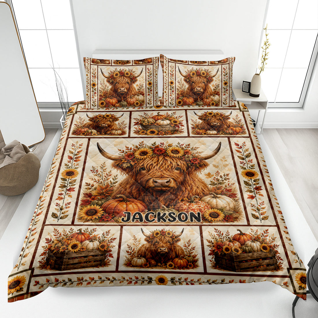 Highland Cow quilt blanket displayed on a bed with sunflowers, pumpkins, and warm autumn foliage