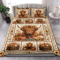 Highland Cow quilt blanket styled in a bright bedroom with pumpkins, sunflowers, and fall foliage