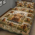 Rustic Highland cow quilt bedding displayed on a bed with barn scenes, wildflowers, sunflowers, and patchwork borders
