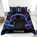 DJ quilt blanket bedding set displayed on a bed with turntables, vinyl records, headphones, and neon music artwork