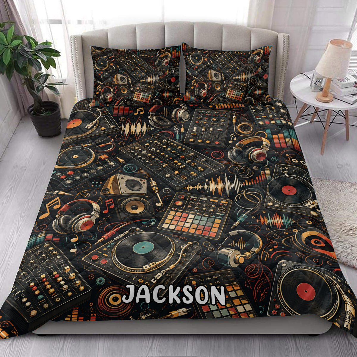 DJ quilt bedding styled in a bright bedroom with turntables, headphones, records, and colorful audio equipment