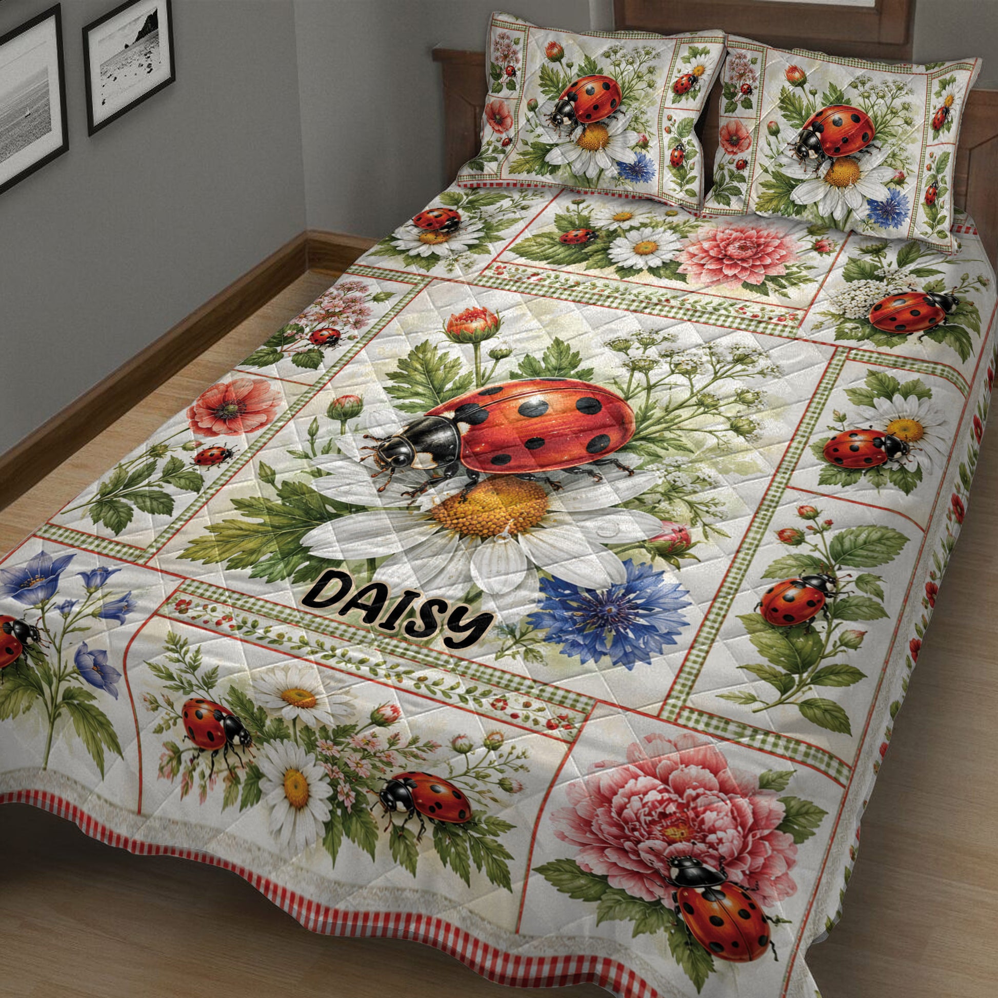 Close bedroom view of a ladybug quilt blanket covered in daisies, peonies, greenery, and garden insects