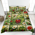 Ladybug quilt blanket displayed on a bed with floral greenery, red flowers, and leafy botanical artwork