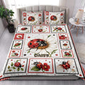 Ladybug quilt blanket styled in a bright bedroom with matching floral ladybug artwork