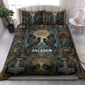 Viking quilt blanket styled in a bright bedroom with raven artwork, Norse symbols, shields, and gold knotwork