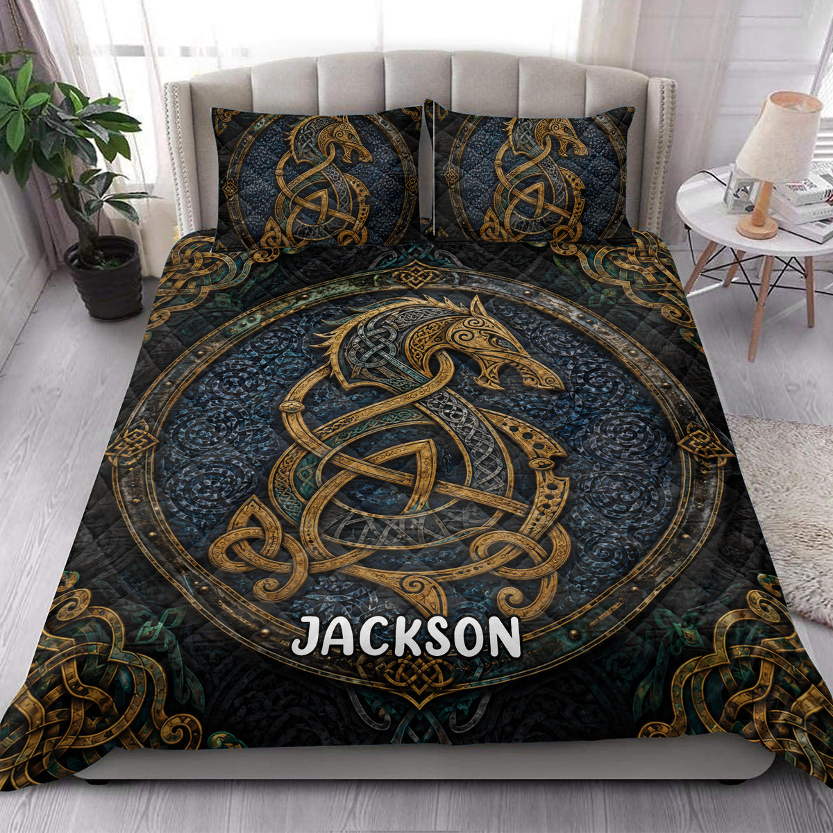 Viking quilt blanket styled on a bright bedroom bed with detailed Nordic dragon artwork