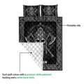 Viking quilt blanket shown with a printed Norse warrior front and white quilted backing