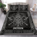 Viking quilt blanket bedding styled on a bedroom bed with black and white Nordic artwork