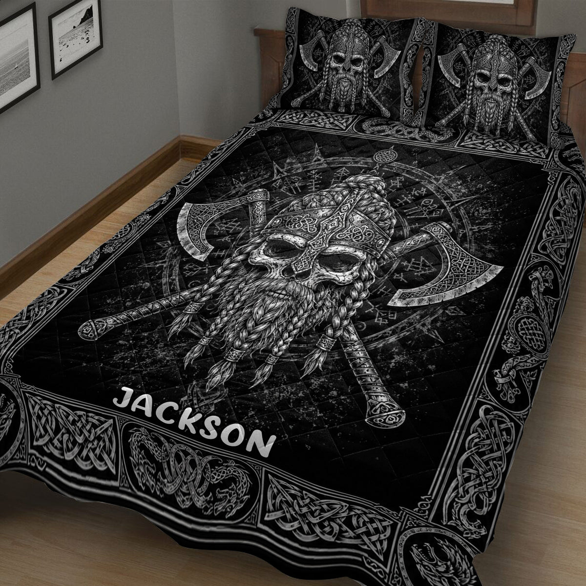 Close view of a Viking quilt blanket featuring a bearded Norse warrior, axes, and knotwork