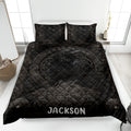 Viking quilt blanket displayed on a bed with dark raven artwork, Norse symbols, shields and intricate knotwork