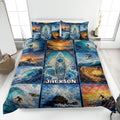Surfing quilt blanket displayed on a bed with surfers, ocean waves, sunset scenes, and surfboard artwork