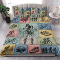 Custom bicycle quilt blanket styled on a bright bedroom bed with cyclists, bicycles, helmets, and shoes
