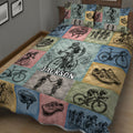 Colorful bicycle quilt blanket displayed in a bedroom with road cyclists, bicycles, helmets, and cycling shoes