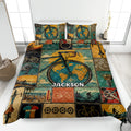 Bicycle quilt blanket bedding set displayed on a bed with vintage cycling collage artwork in teal and gold