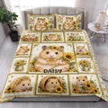 Hamster quilt blanket styled on a bed with sunflower scenes, paw prints and warm farmhouse colors
